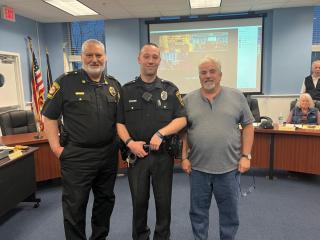 Pictured: Chief Marcelli, Officer Rose, Mayor Uzman